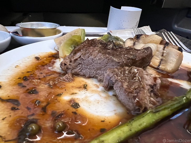 a plate of meat and vegetables