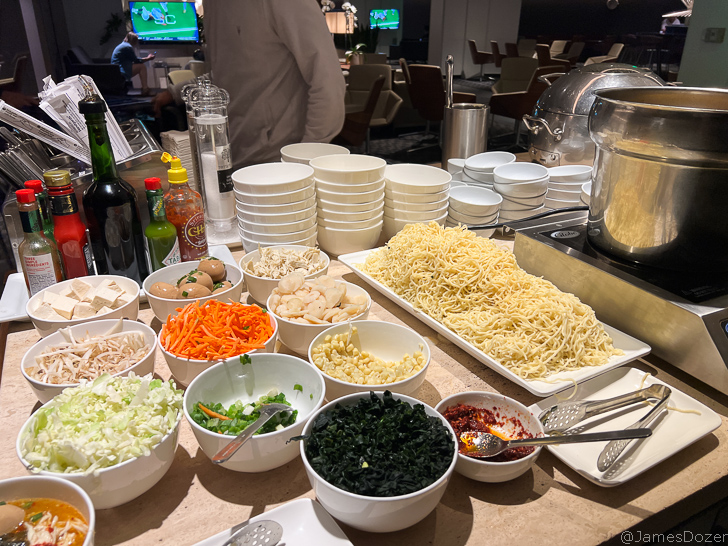 a table with bowls of food and bowls of food
