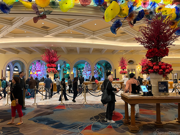 a group of people in a hotel lobby