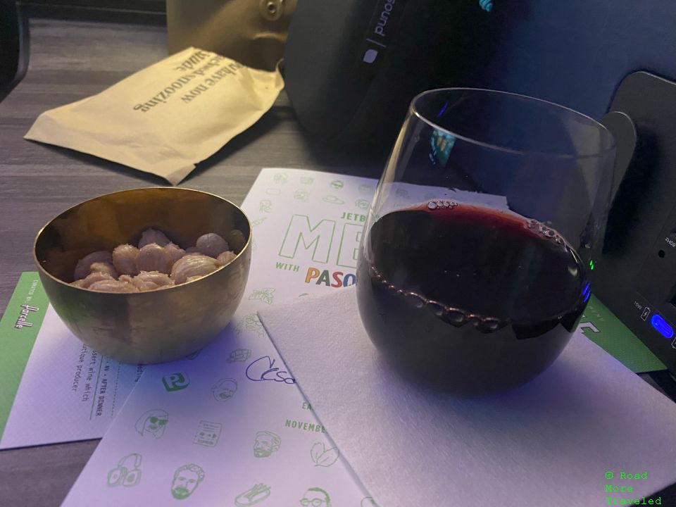 jetBlue A321neo Mint Business Class - drink service with macadamia nuts