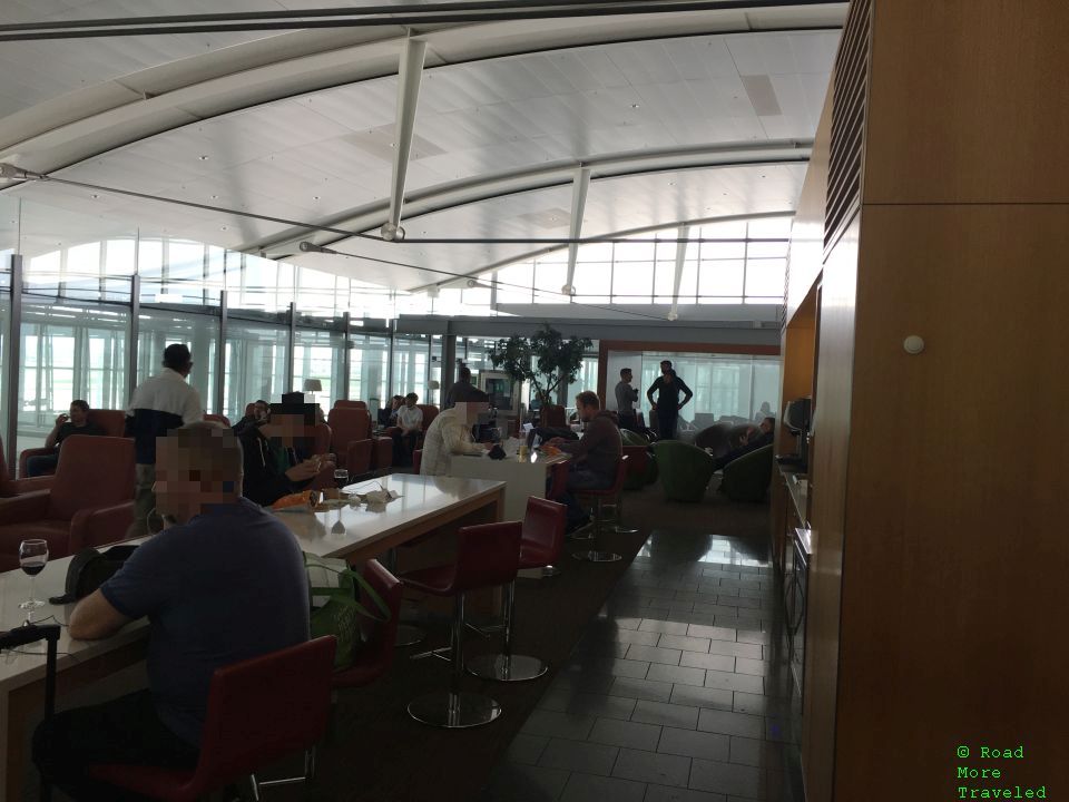 Air Canada Maple Leaf Lounge YYZ International - high-top seating and self-service beverage station