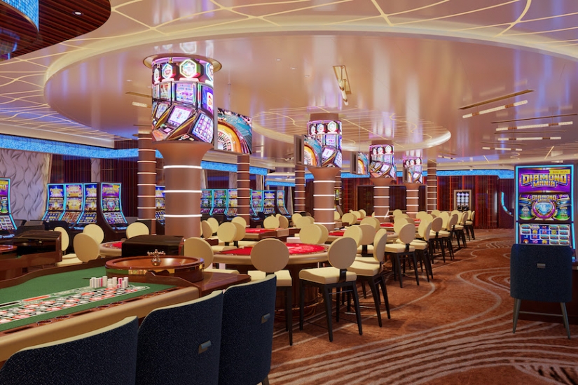 a room with poker tables and chairs