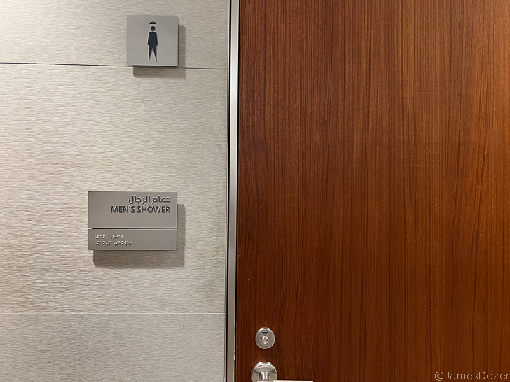 a door with a sign and a handle