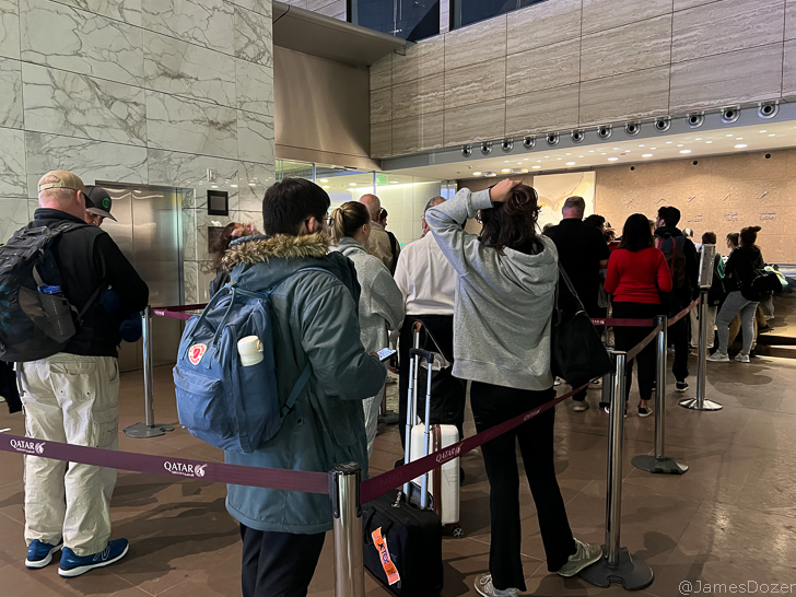 a group of people standing in a line