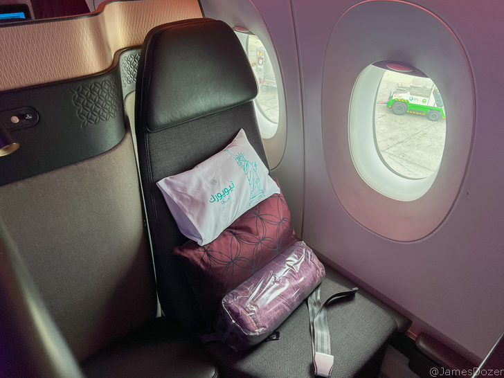 a seat with a pillow on it