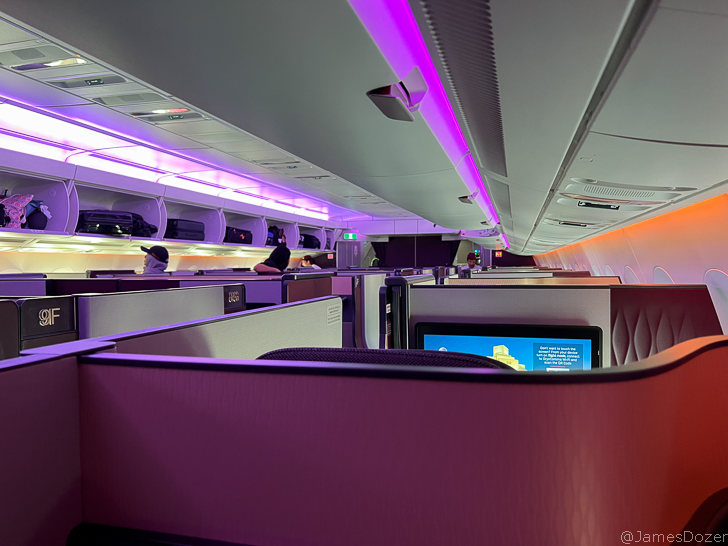 an airplane with purple lights