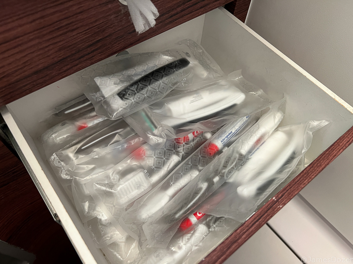 a drawer with a drawer full of toothbrushes