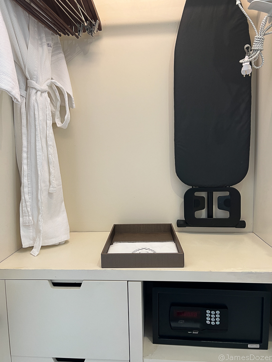 a white robe on a shelf