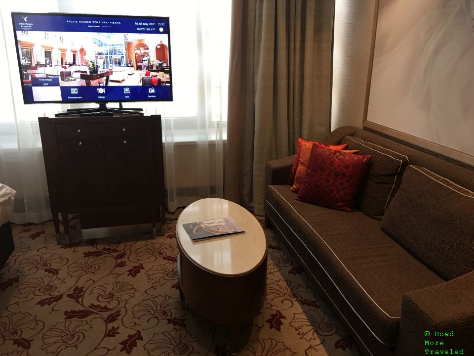 Palais Hansen Kempinski Superior Room sitting area and TV