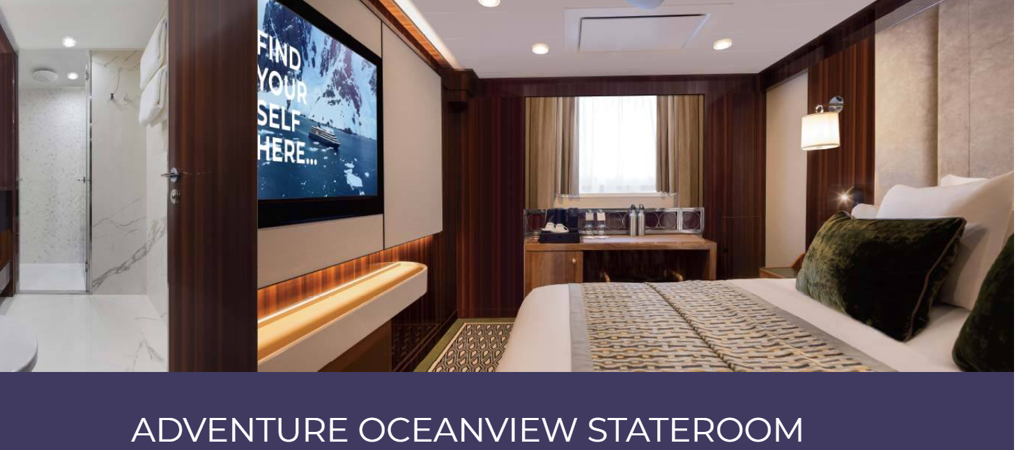 a room with a television and a mirror