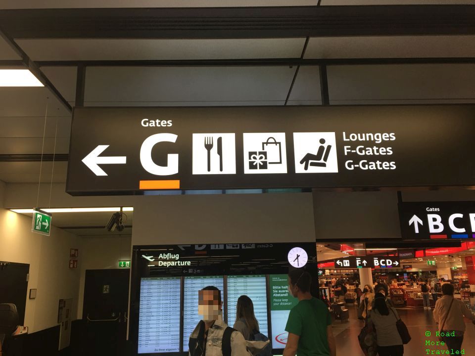 Signs to F and G lounges at VIE