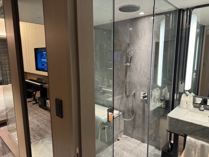 a bathroom with a glass shower