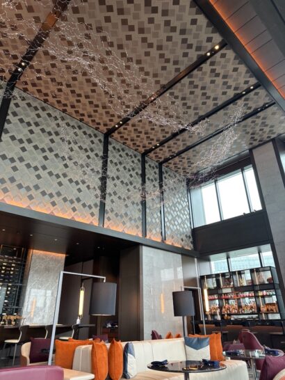 a room with a ceiling and a table