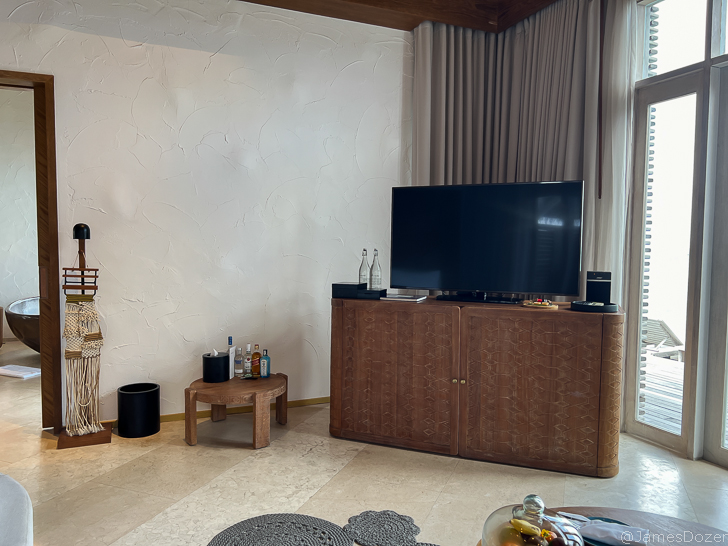a tv on a cabinet in a room