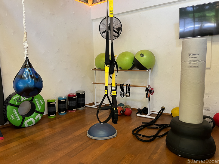 a gym with a variety of equipment