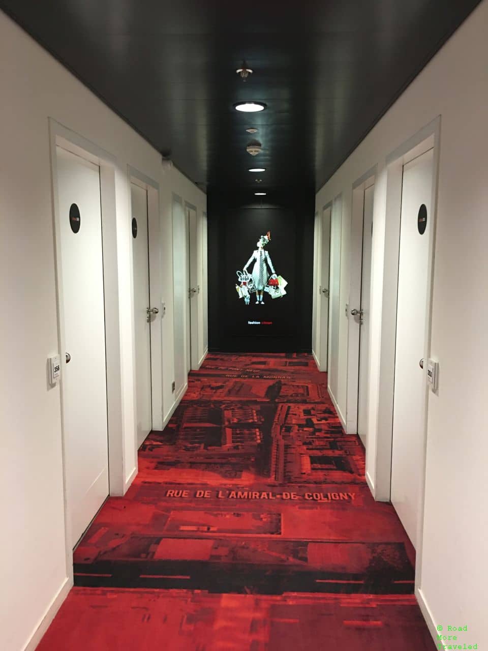 citizenM Paris Charles de Gaulle Hotel - guest room corridor artwork
