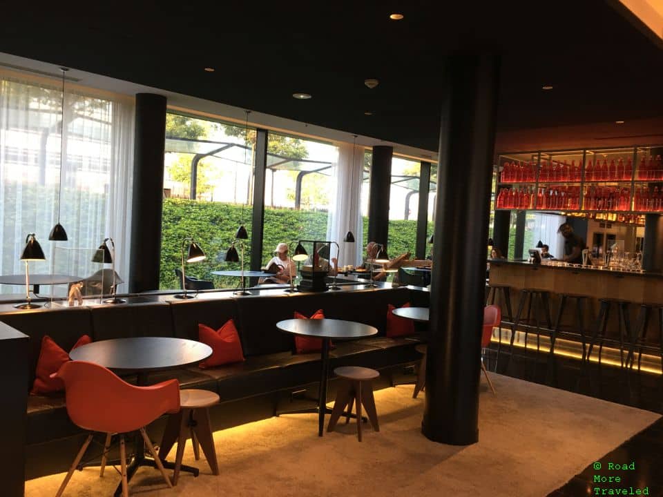Dining area in front of bar at citizenM CDG