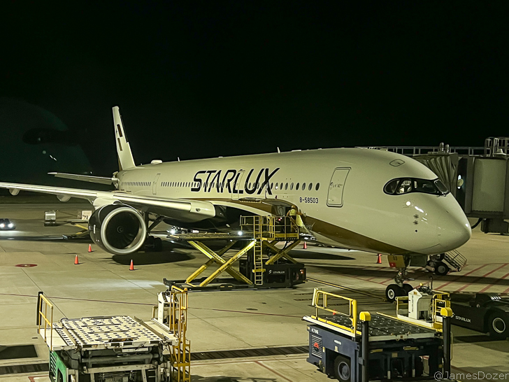 a plane on the tarmac at night