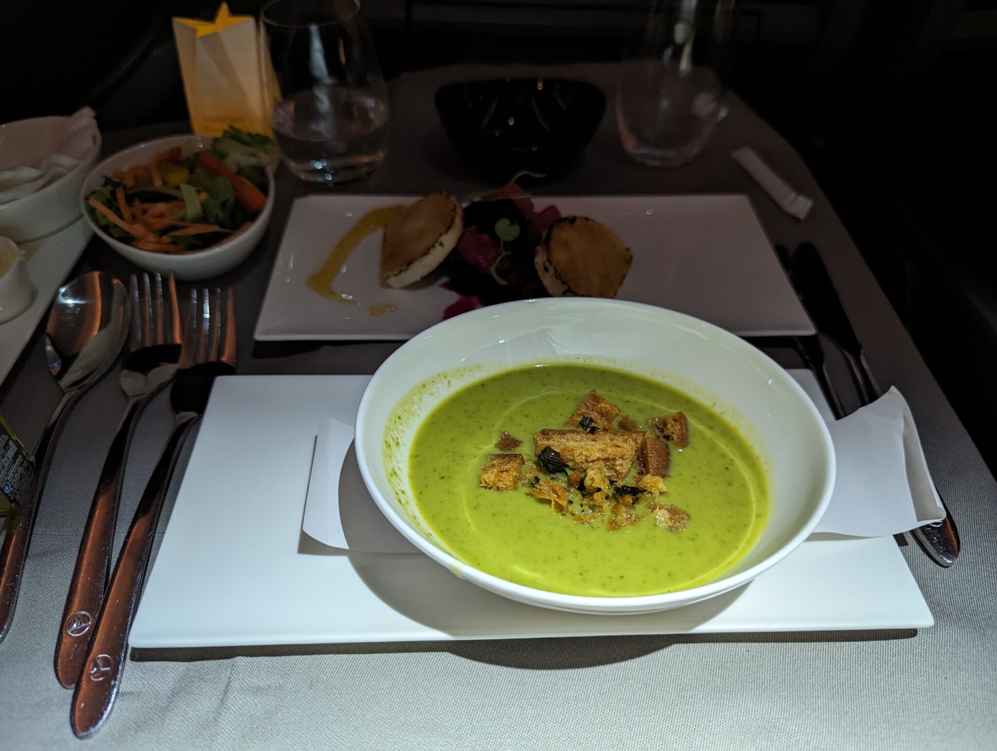a bowl of soup on a tray