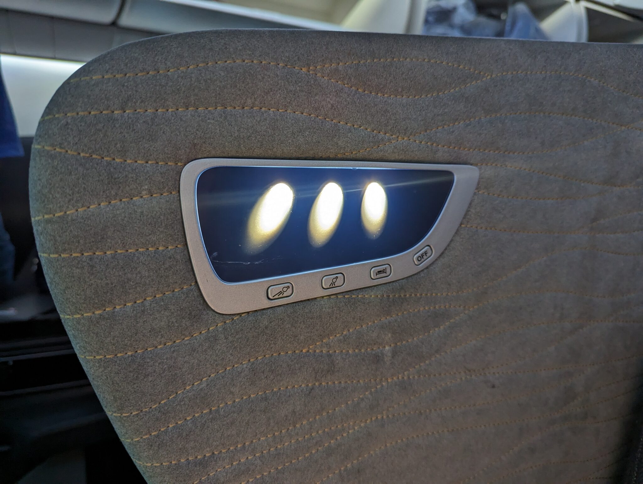 a seat with a rectangle and three lights