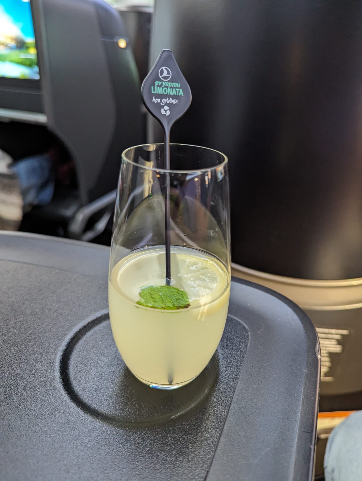 a glass with a drink in it
