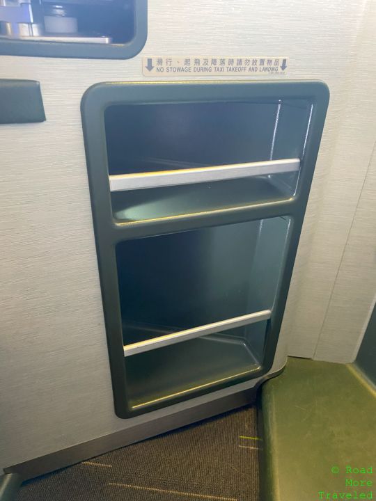 BR B77W Business Class seat storage