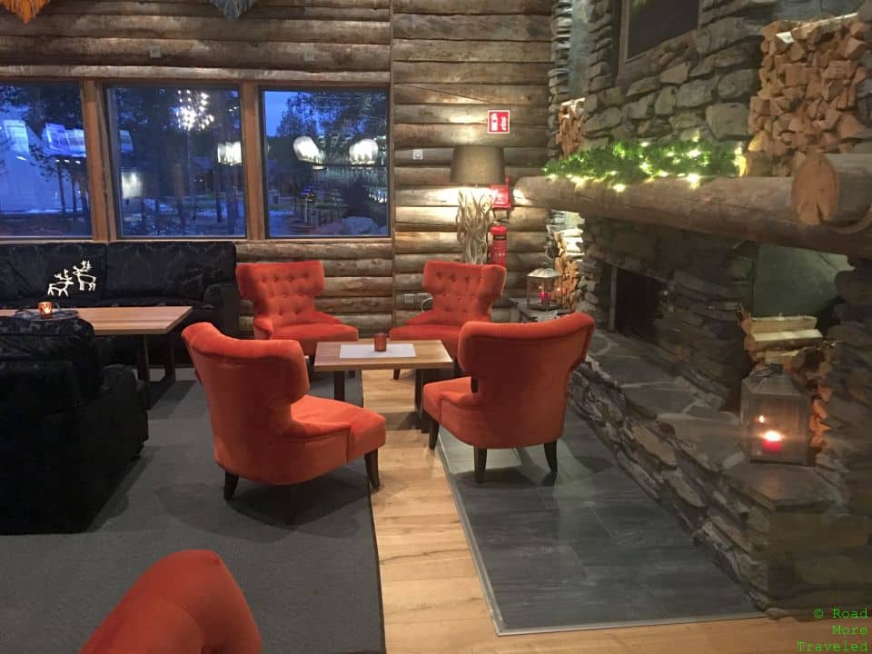 Wilderness Hotel Inari - lobby seating and fireplace