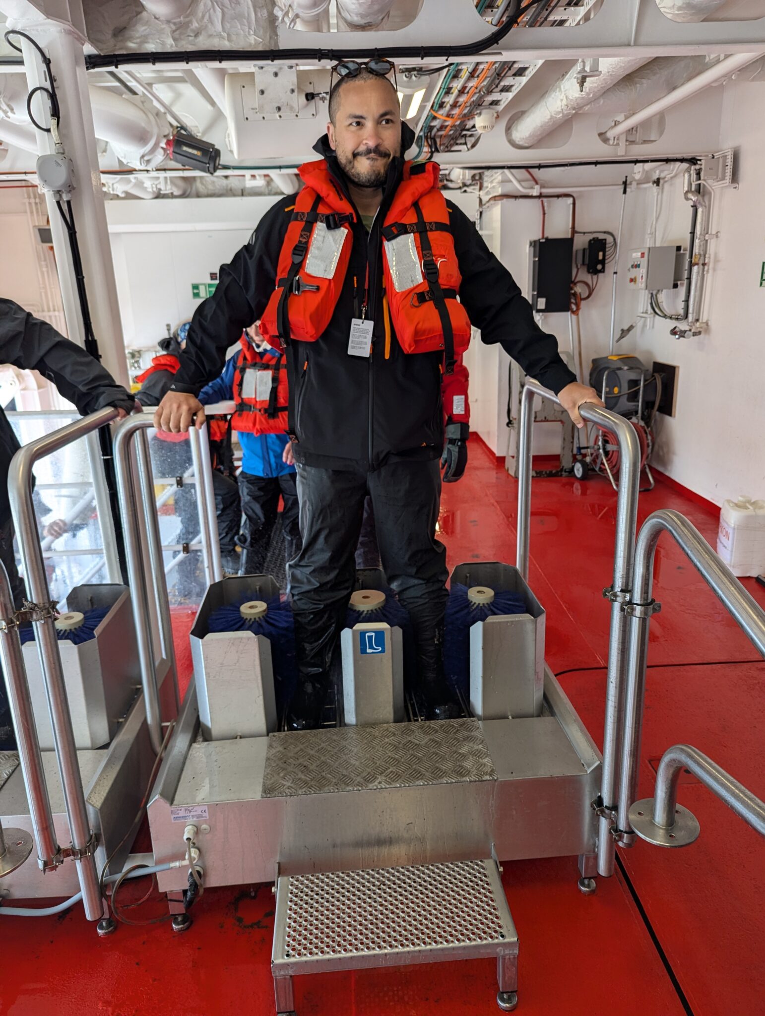 a man standing on a machine