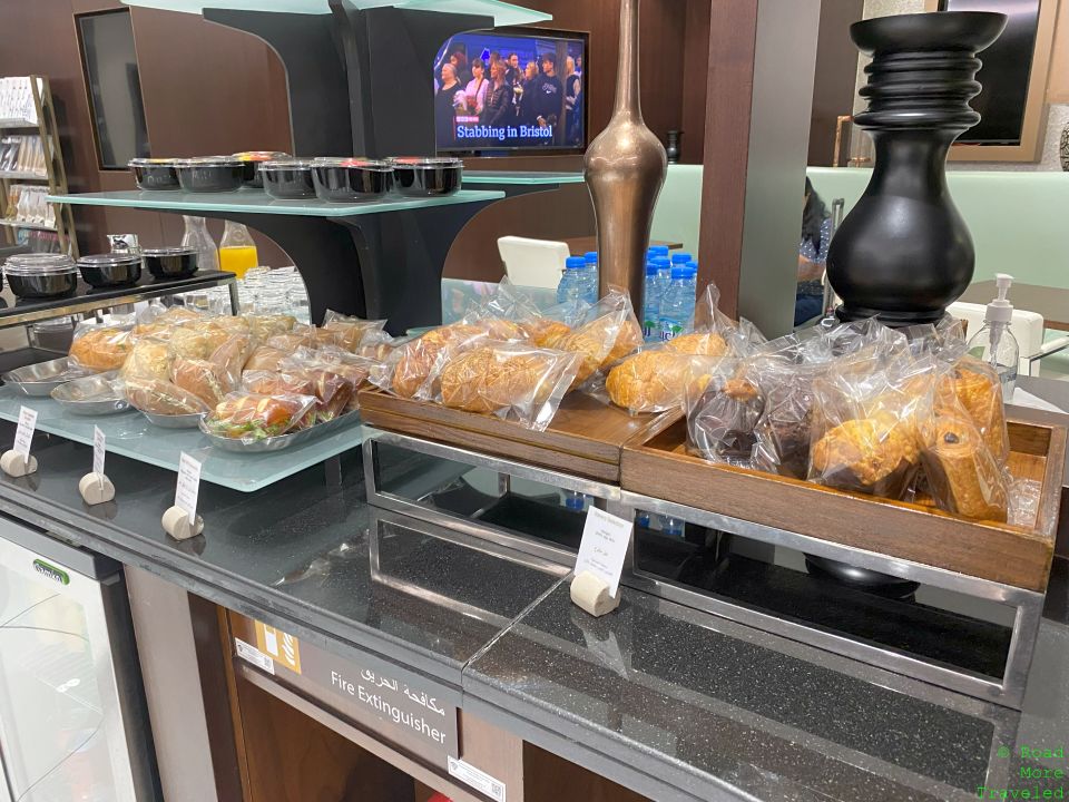 EY Pre-Clearance Lounge AUH packaged snacks, water, juice