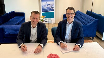 two men sitting at a table