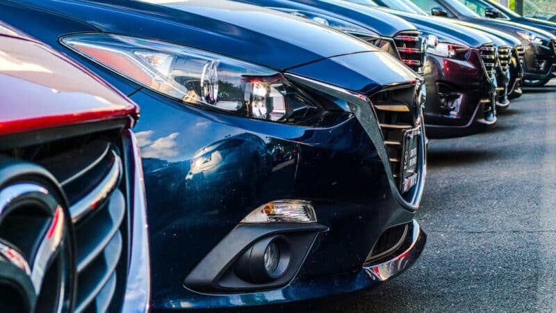 a row of cars parked in a row
