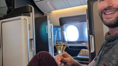 a man holding a glass of wine