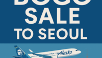 a blue and white poster with a plane flying over a city