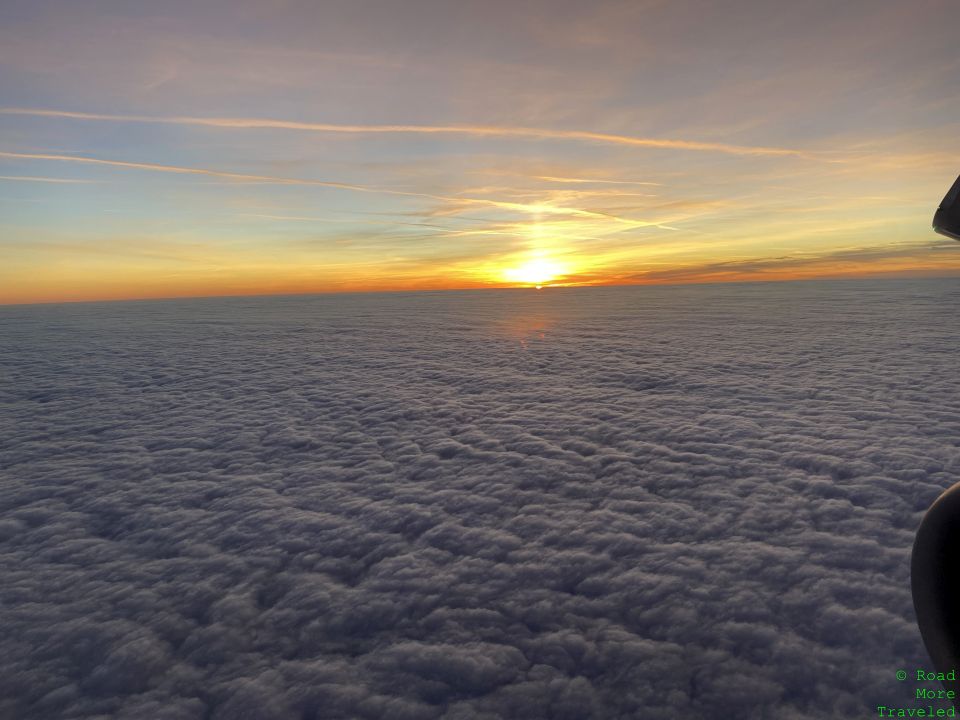 Sunset over clouds between GLA and LHR