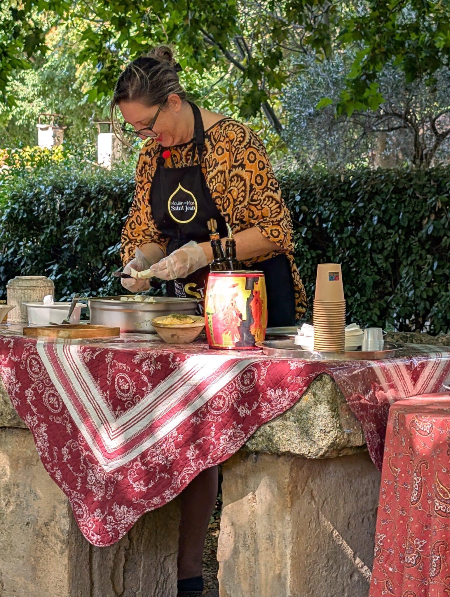 a woman cooking food outside