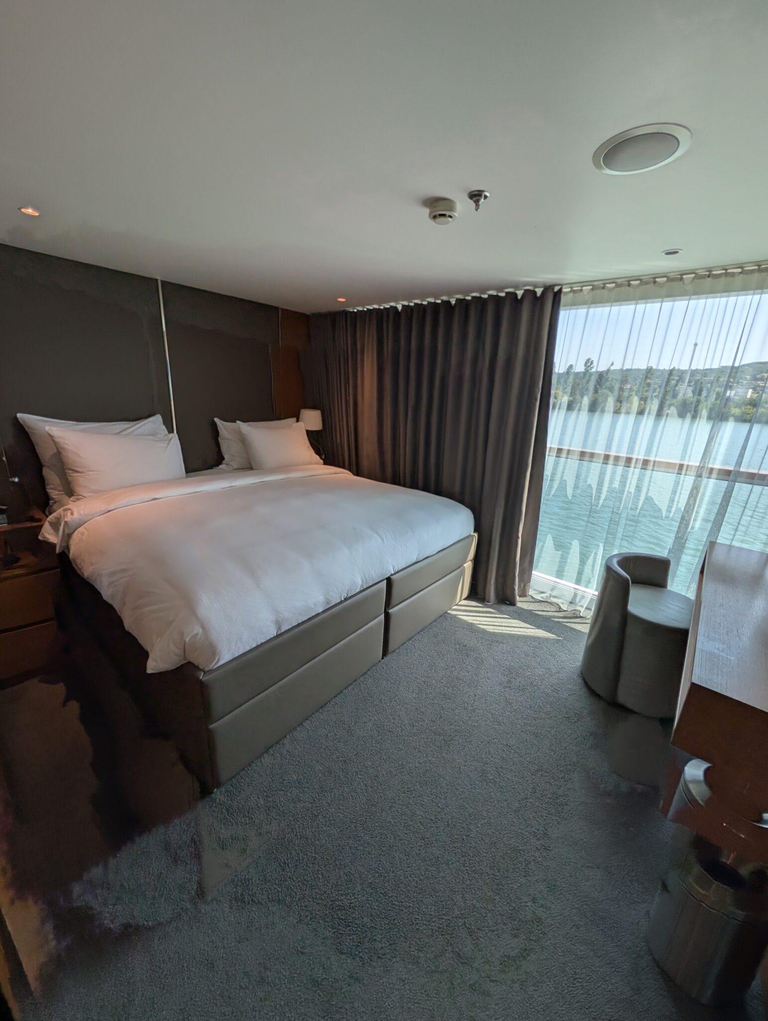 a room with a bed and a window