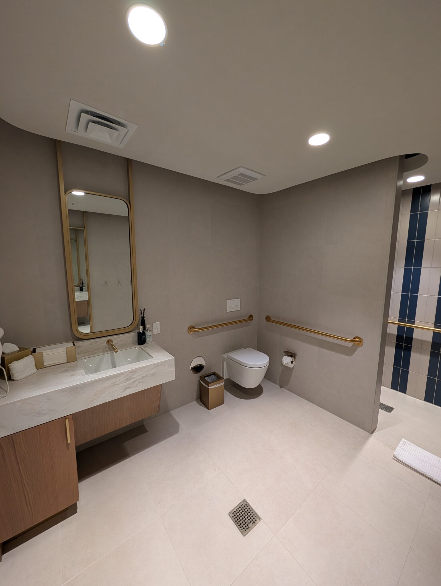 a bathroom with a sink and mirror