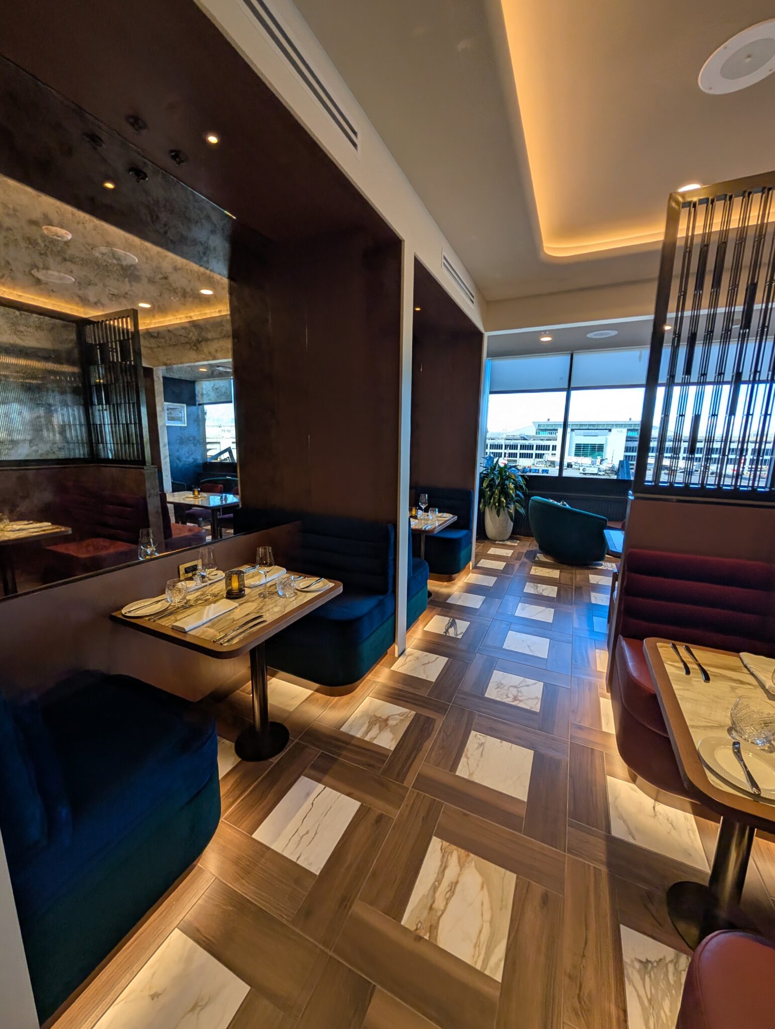 a restaurant with tables and chairs