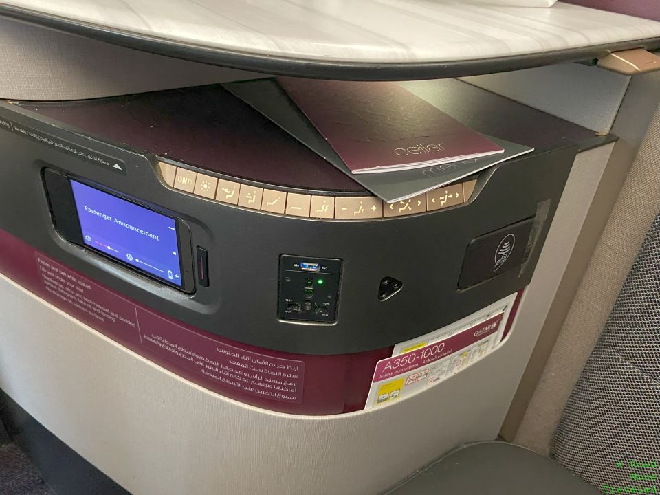 Qatar Airways A350-1000 QSuites Business Class - tray table storage