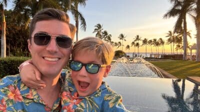 a man and boy taking a selfie