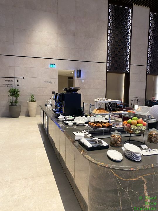 Qatar Airways Al Mourjan Garden Lounge Doha front of main seating area bar and snacks
