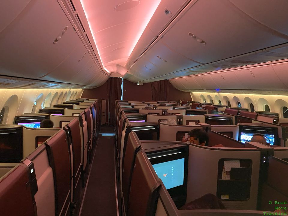 an airplane with seats and a television