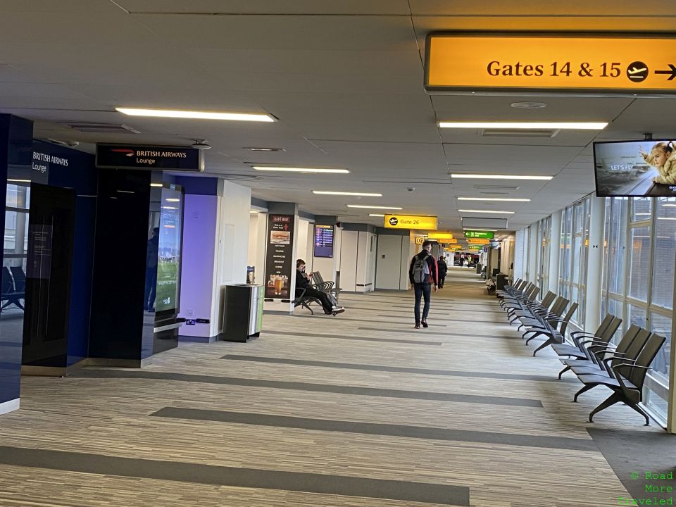 a group of people walking in an airport