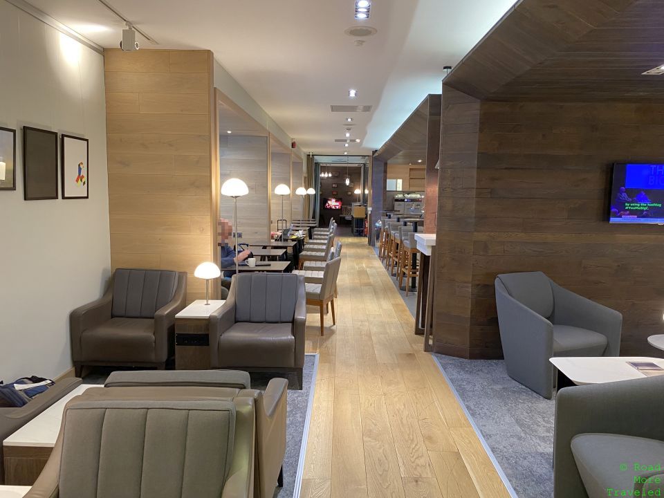 a room with chairs and tables