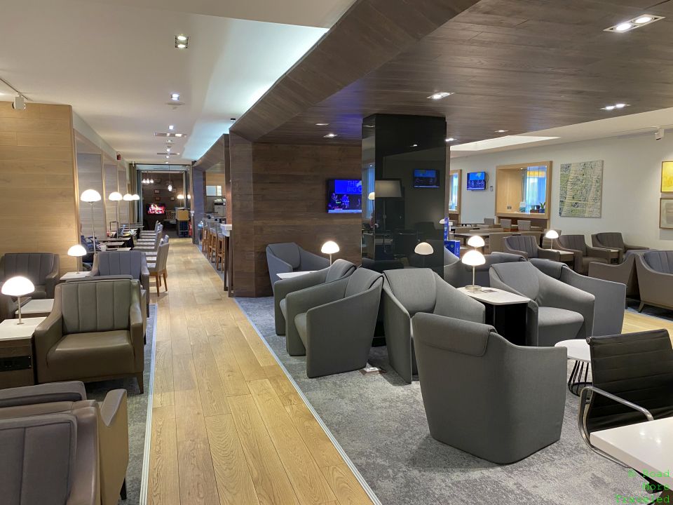 a room with couches and tables