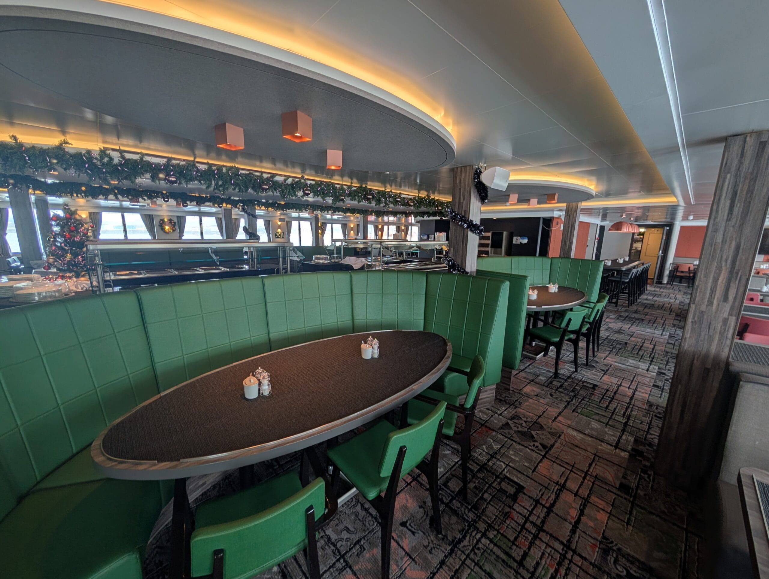 a restaurant with green seats