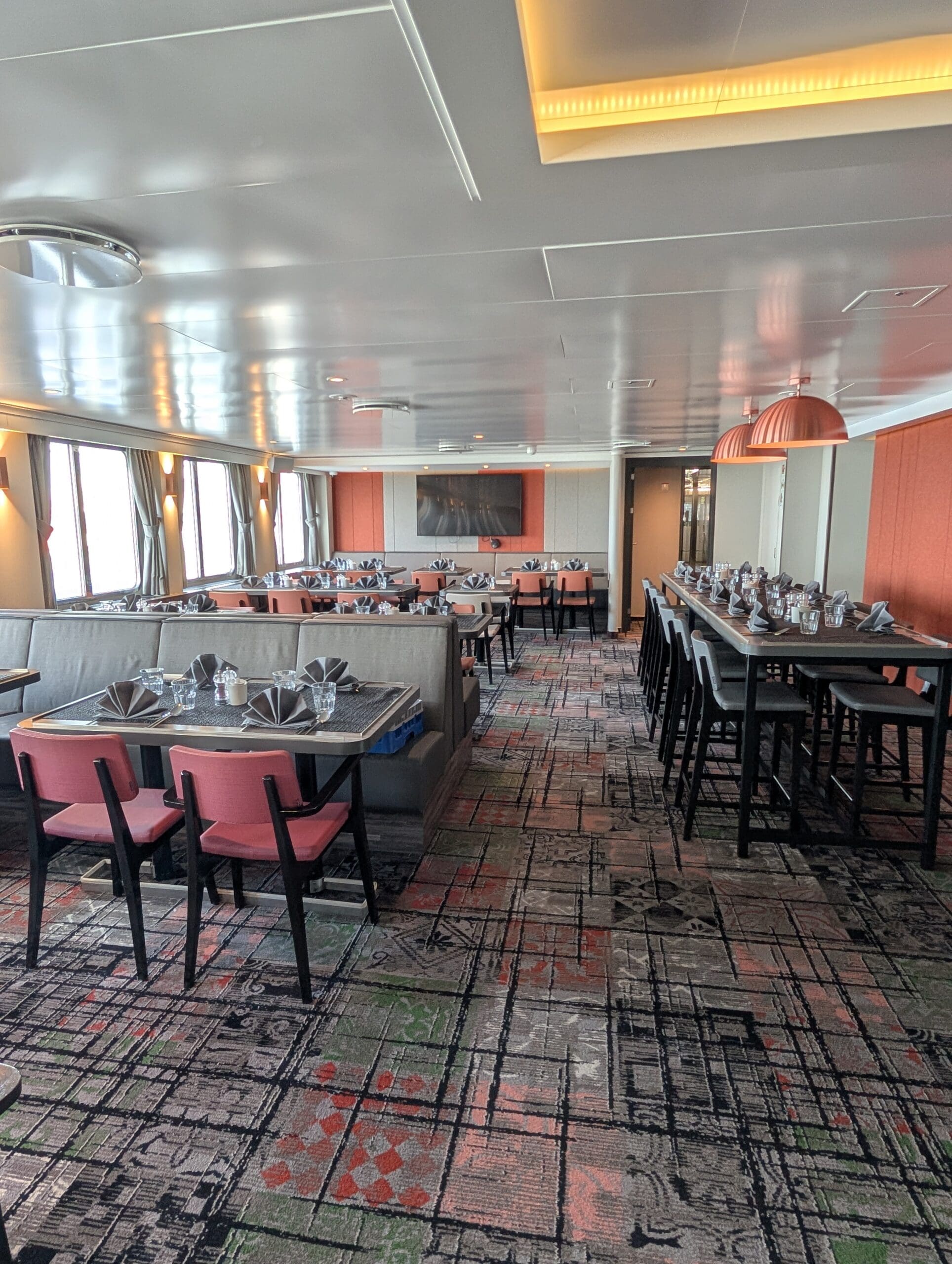 a room with tables and chairs