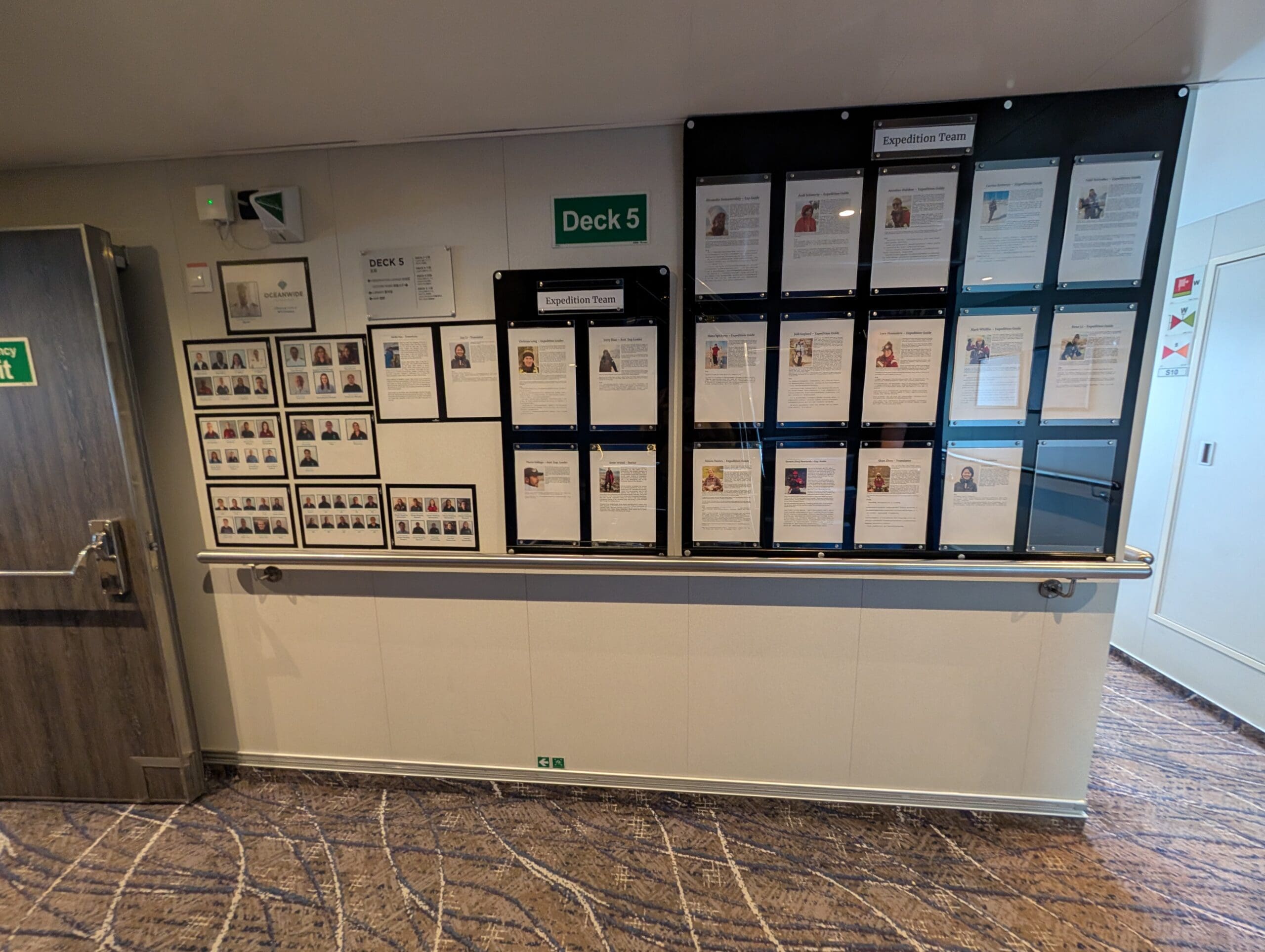 a wall with papers on it