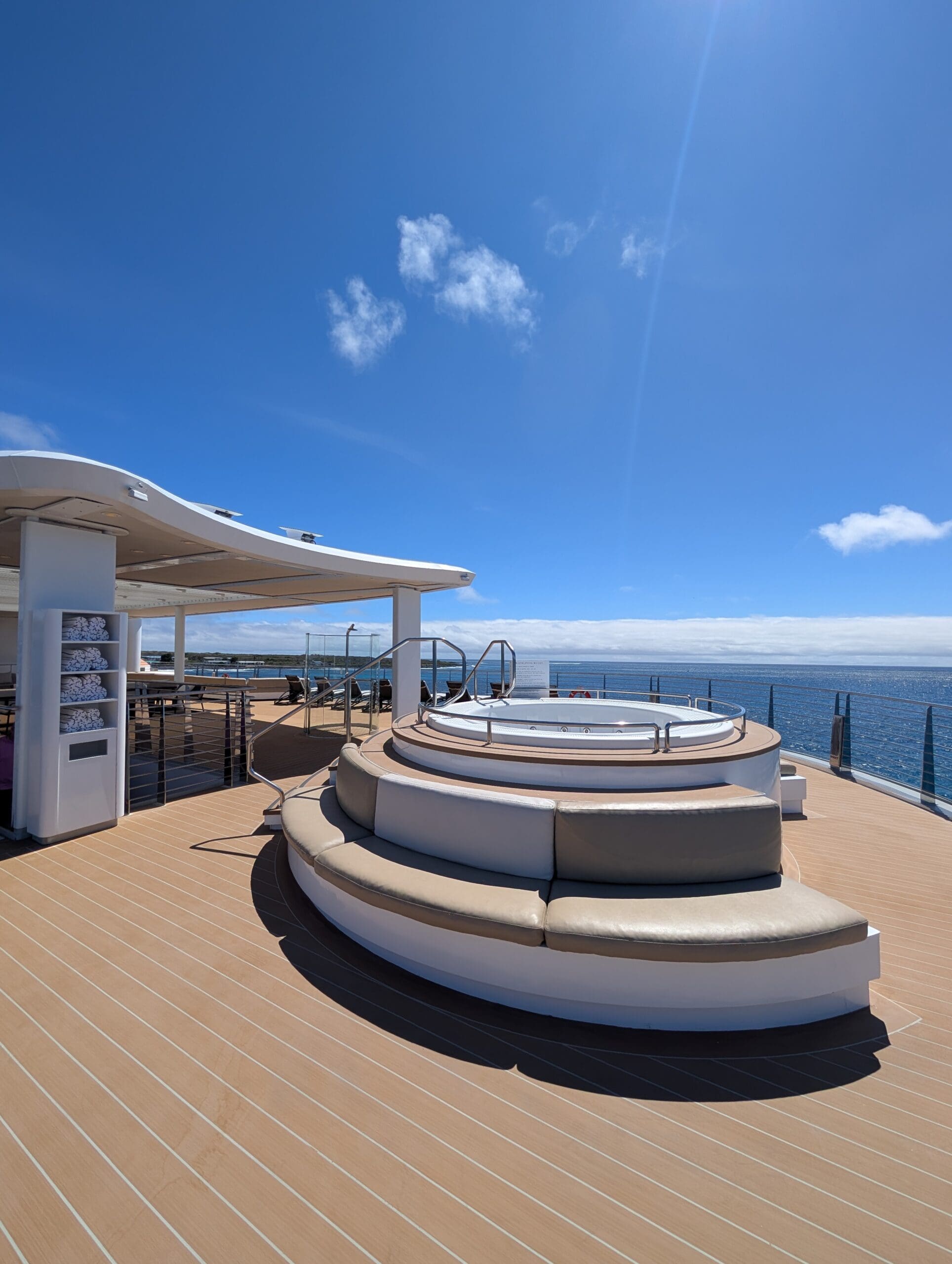 a deck with a large round staircase on it