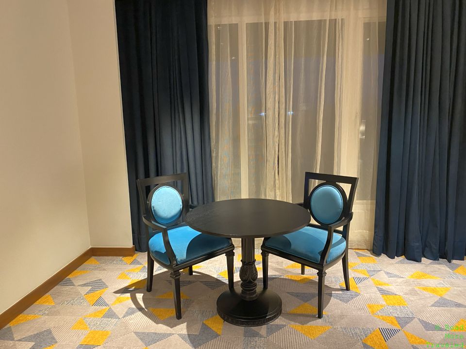 a table and chairs in a room